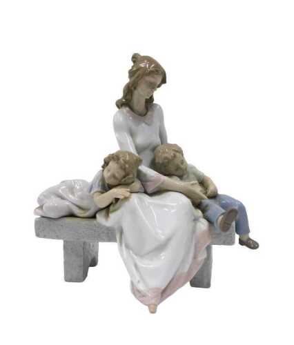 A Lladro figure group An Afternoon Nap 6765, 34cm high. (boxed)
