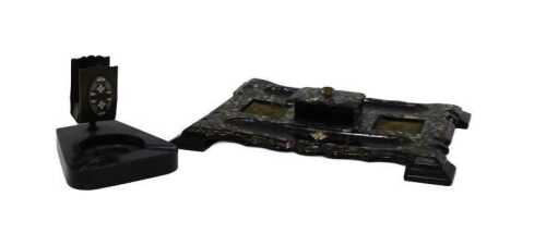 A late 19thC papier mache pen stand, with central box, space for inkwell and pens, with...