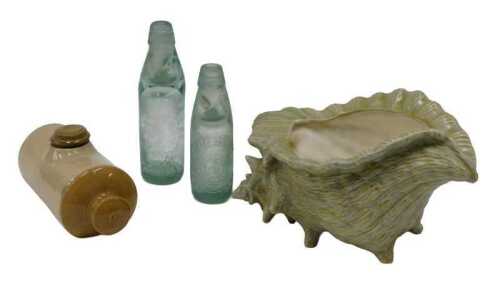 A green glass bottle with marble Verity & Co Limited with fox design, 23cm high, another, Smith...