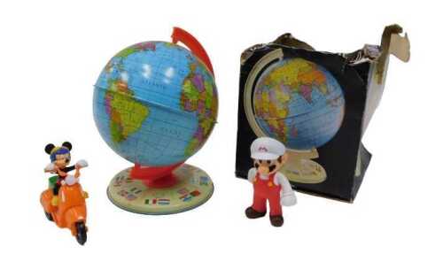 A child's tin plate and plastic globe, on axis, 24cm high, partially boxed, Minnie Mouse on bike...