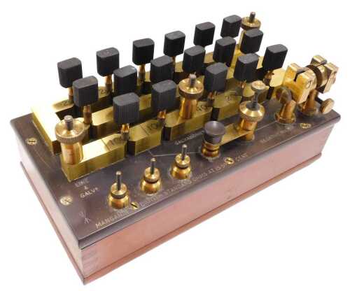 A Wheatstone Muirhead bridge device, circa 1915, used for measuring electric resistance, cased,...