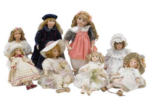Various dolls, modern bisque finish and others, dolls clothing, many on stands, 55cm high, etc.,...