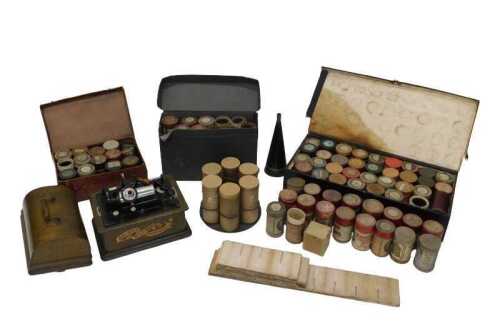 An early 20thC Edison orange N JUS phonograph, with turned handle in oak case, with tin horn in...