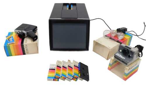 Various Polaroid cameras, associated items, Polaroid camera, 10cm wide, various other associated...