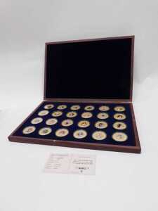 A Windsor Mint Historic Moments of Queen Elizabeth II&rsquo;s reign set, 24ct gold plated copper,... - 2
