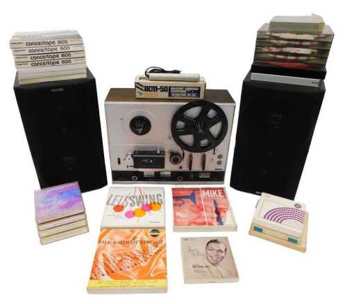 An Akai 40000 reel to reel player, 41cm wide, and various reels. (a quantity) WARNING! This lot...