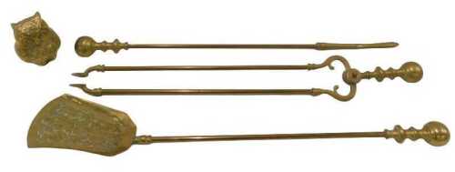 An early 20thC Regency design three piece companion set, and a brass figure of an owl, 12cm high....