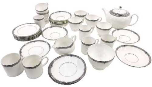 A Wedgwood Amherst part service, to include teacups, coffee cups, teapot, 16cm high, plates,...
