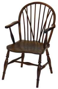 A 19thC yew and elm Windsor chair, of plain form with spindle turned supports, the seat rail...