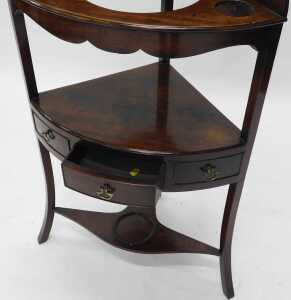 A George III mahogany corner washstand, with a raised back and recesses for bowl and beakers and... - 3