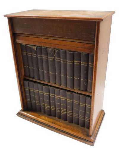 Various miniature classic books and works, to include Shakespeare, Milton's poems, etc., in oak...