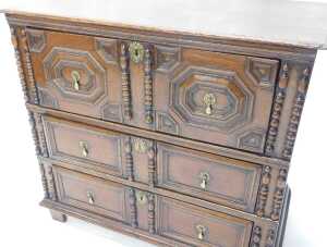 A late 17thC oak chest of drawers, the top with a moulded edge above three panelled drawers,... - 2