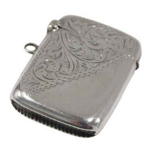 A George V silver Vesta case, by Joseph Gloster, of oblong form, match strike base, 5cm high,...