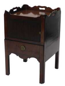 A George III mahogany night commode, the square top with a raised and pierced top above a...