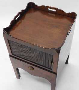 A George III mahogany night commode, the square top with a raised and pierced top above a... - 2