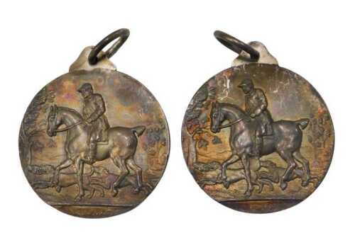 A silver medallion Light Horse Breeding Society, with ring top, raised with horses, 1912, and...