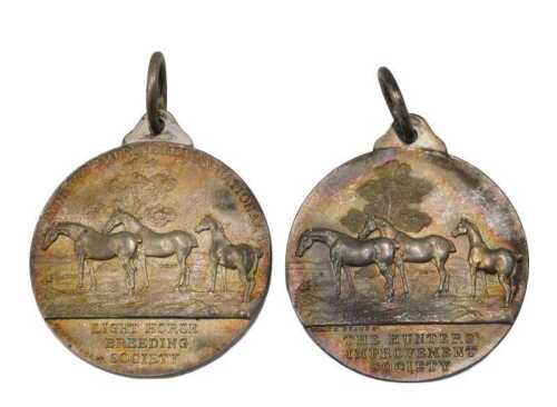 A silver medallion Light Horse Breeding Society, with ring top, raised with horses, 1912, and...