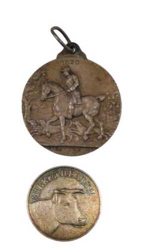 A silver The Hunters Improvement Society horse medal 1920, 5cm high, and a further Milk for...