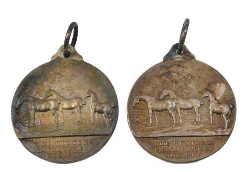 A silver medallion Light Horse Breeding Society, with ring top, raised with horses, 1912, and...