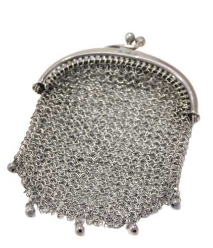 An early 20thC chainmail coin purse, with orb clasp, marked 925, 7cm high.