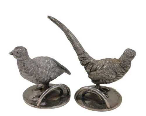 Two George V silver menu holders, pheasant and partridge, each individually named David and...