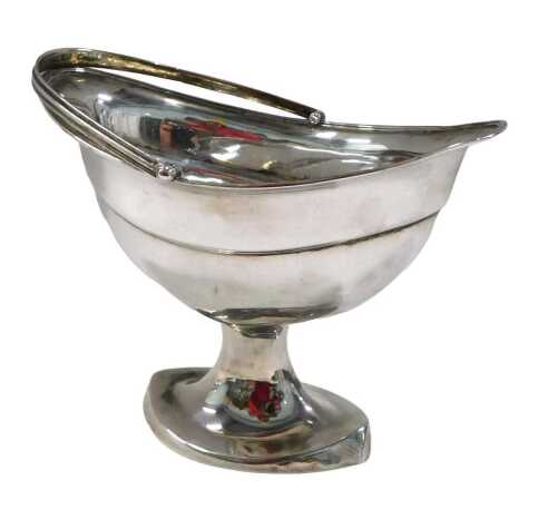 An 18thC Irish silver basket, by William Bond, with swing handle, cape bowl, inverted stem and...