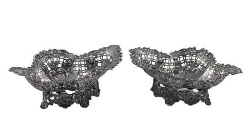 A pair of Victorian silver dishes, by James Dixon & Son, each of compressed flower head form,...