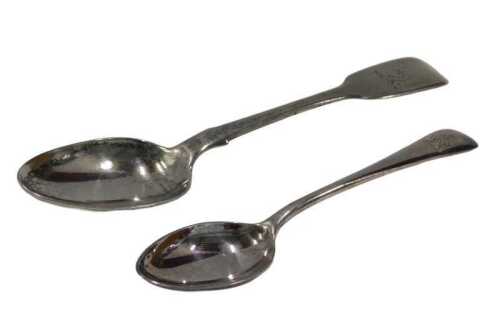 A Victorian silver teaspoon, fiddle pattern, London, probably 1842, 15cm long, 0.6oz, and a...