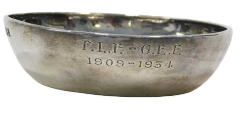 A George V silver wine taster, by CJ Vander Limited, of plain circular form, with entwined...