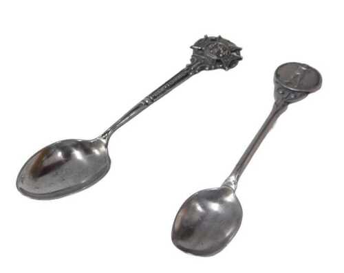 A golfing spoon, with golfer head, marked silver, 10cm long, and a further Look Forward Society...