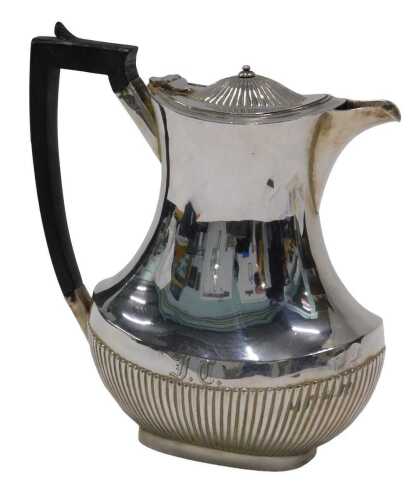 A 20thC coffee pot, part gadrooned with ebonised angular handle, on oval foot, initialled JAC,...