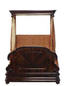 A Victorian figured mahogany half tester bed, the moulded canopy with drop finials, the shaped...