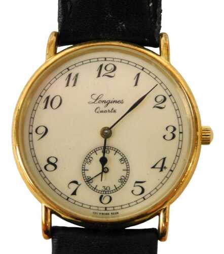 A Longines Charleston gent's wristwatch, the cream numeric dial with seconds dial, in gold...