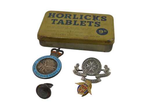 Badges, comprising a silver Royal Observer Corps enamel cap badge, 4cm high, 12.9g, a St John's...