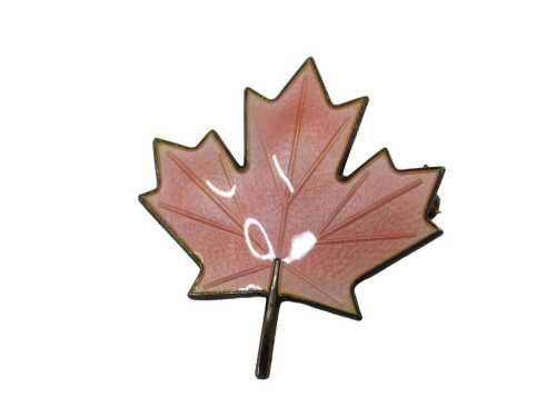 A Norwegian enamel brooch, of a maple leaf with pink enamel decoration, stamped Norway sterling...
