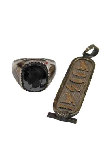 Two items of silver jewellery, comprising an Egyptian ingot style pendant, 4cm high, and a...
