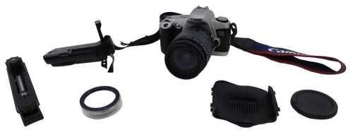A Canon EOS 500N camera, with Sigma Zoom 28-200mm 1:3.8-5.6 lens, various other accessories,...