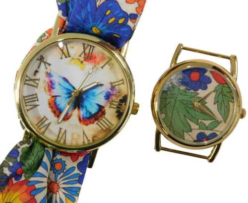 A Liberty's ladies wristwatch head, decorated with two leaves and a blue flower, 2.5cm wide (AF),...