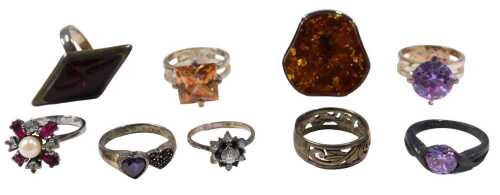 Nine silver dress rings, mainly stone set, to include clusters, imitation amber, wedding bands,...
