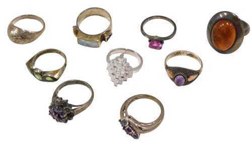 Eight silver and other dress rings, some stamped 925, others unmarked, to include a moonstone...
