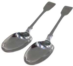A pair of Victorian silver fiddle pattern serving spoons, each bearing the initials AEM, maker...