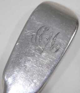 A pair of Victorian silver fiddle pattern serving spoons, each bearing the initials AEM, maker... - 2