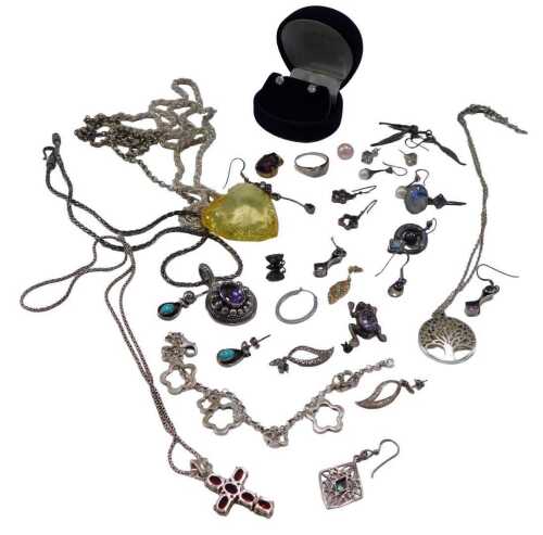 A group of assorted silver and other costume jewellery, to include pendants and chains, dress...