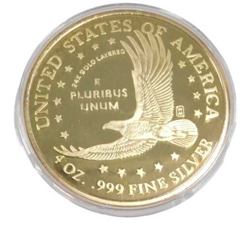 A Washington Mint 2000 quarter pound commemorative coin, 0.999 pure silver layered in 24 karat...