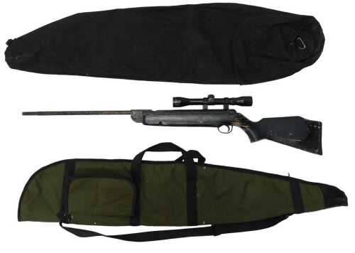 A Webley & Scott .22 air rifle, with sight, 110cm long, with outer canvas case.