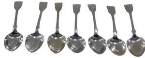 A matched set of seven silver fiddle pattern dessert spoons, four London 1841 and three London...