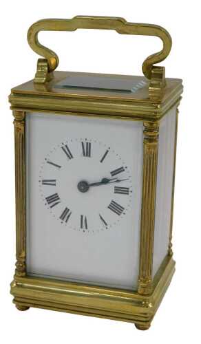 A 20thC brass carriage clock, with Roman numeric dial, in five piece glazed case with swing...
