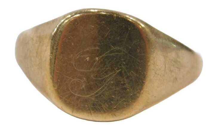 A 9ct gold signet ring, the rectangular ring head bearing rubbed initials, ring size X&frac12;, 5.6g.