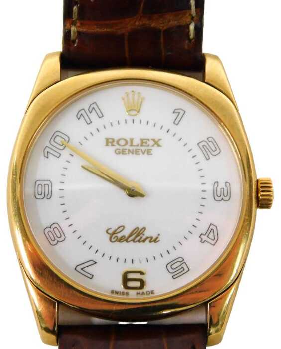 An 18ct gold Rolex Geneve Cellini wristwatch, the white circular numeric dial, in a gold casing,...