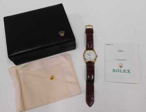 An 18ct gold Rolex Geneve Cellini wristwatch, the white circular numeric dial, in a gold casing,... - 4